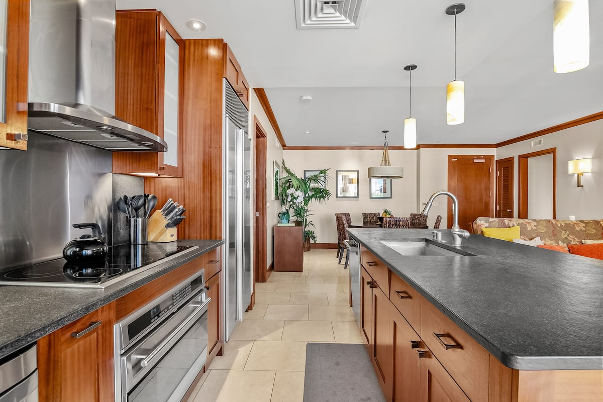 Fully equipped kitchen opening to the dining and living area